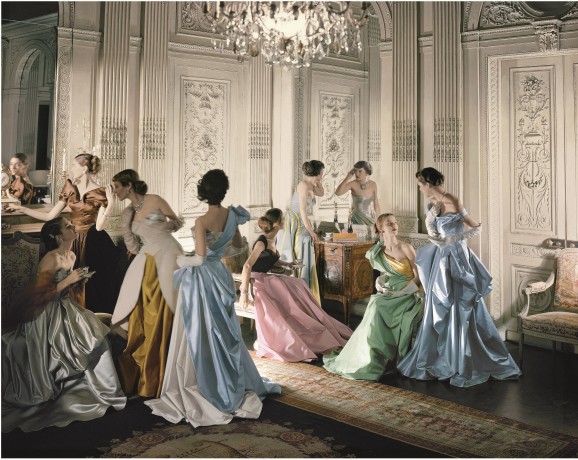 Eight models wearing Charles James gowns, in French & Company's eighteenth century French paneled room